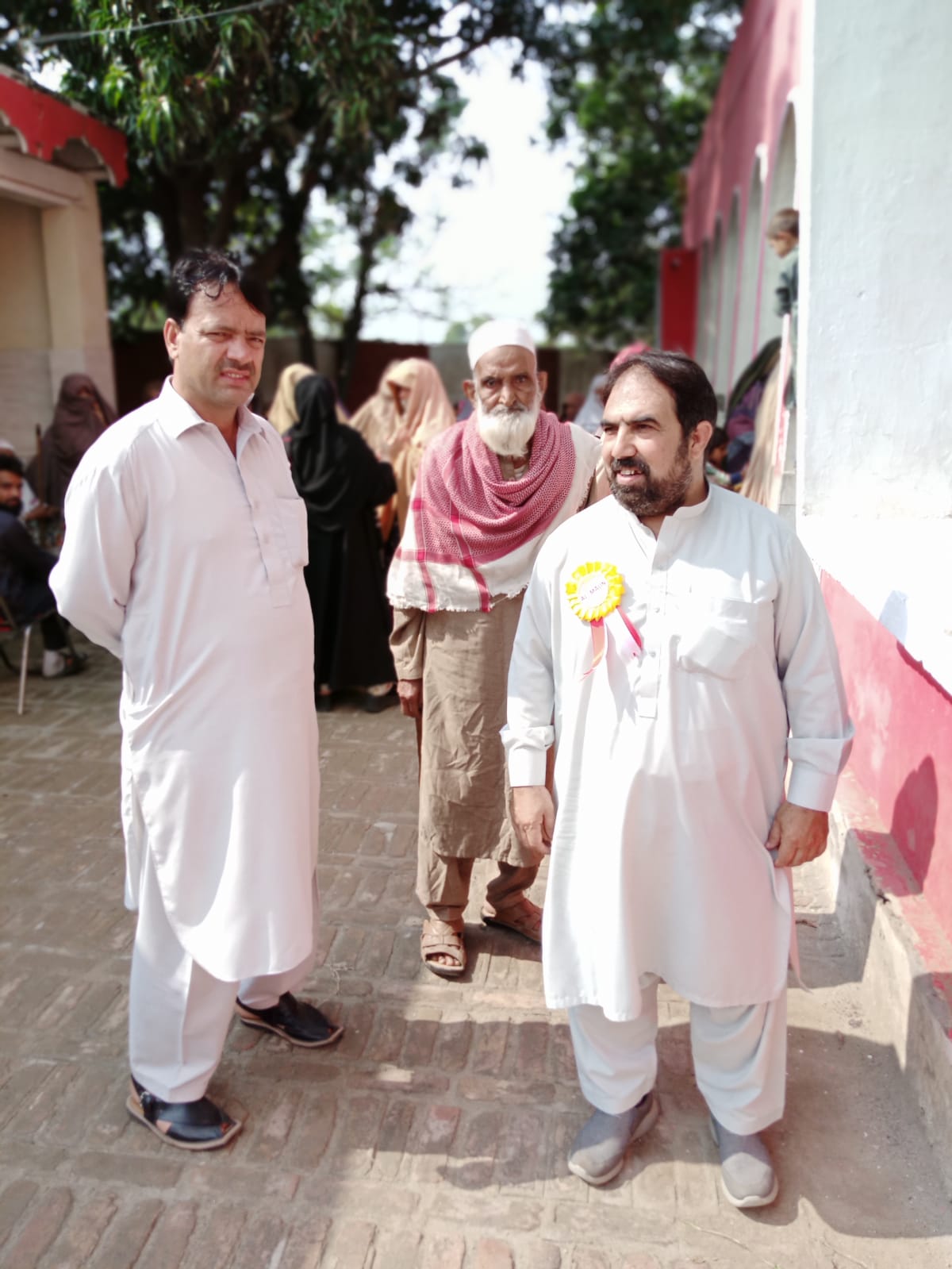 Volunteers walking through the community