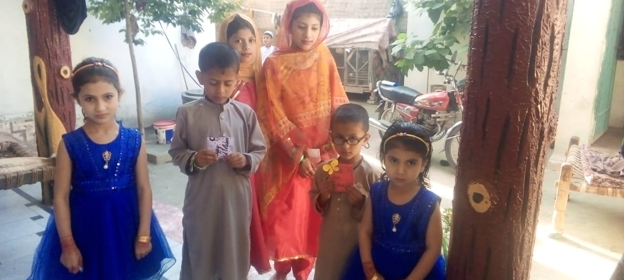 Children holding care packages
